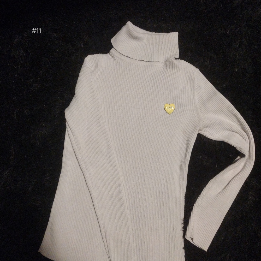White Turtleneck with "Hope" Pin